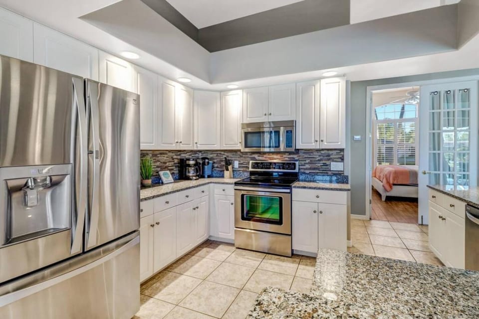 Kitchen or kitchenette, dishwasher, oven, stove, toaster