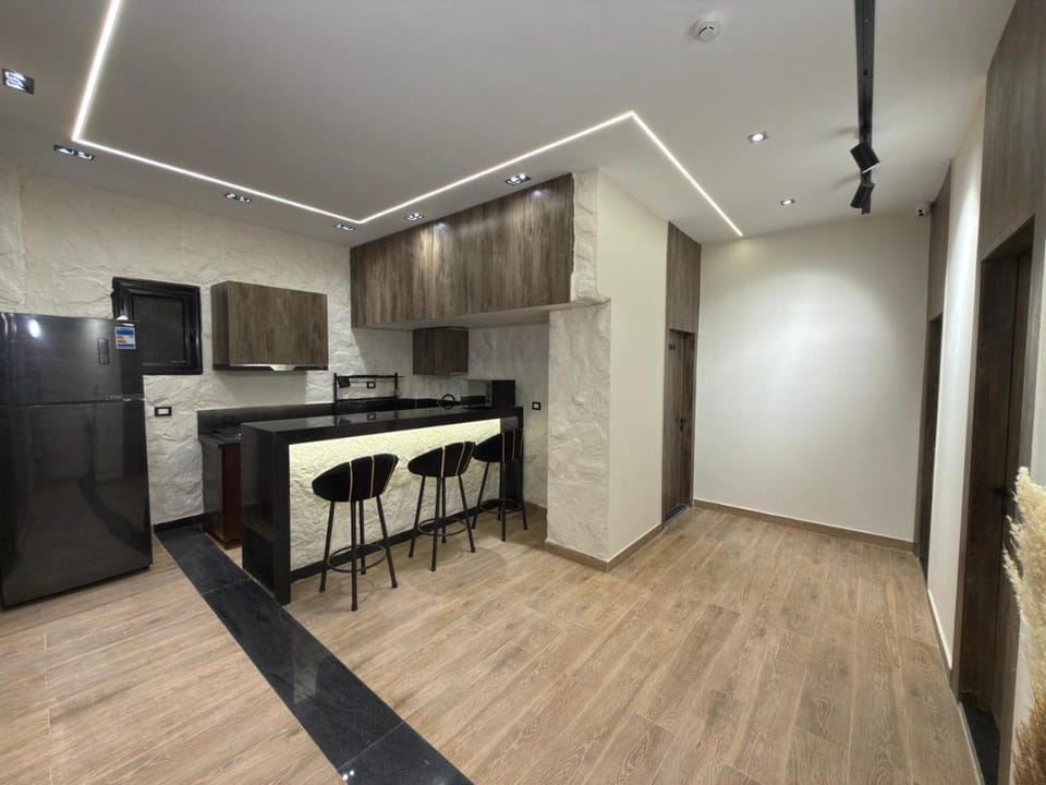 Lounge or bar, Dining area, microwave, stove, kitchen