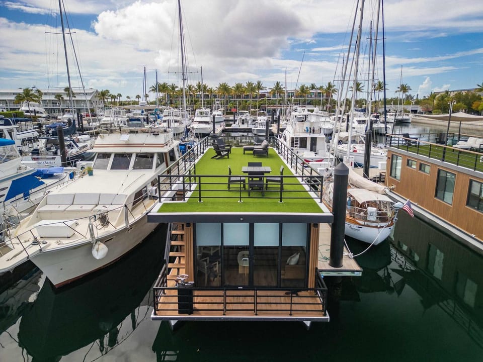 Waterfront & Heated Pool - Break Awai Floating Villa Docked boat in Stock Island