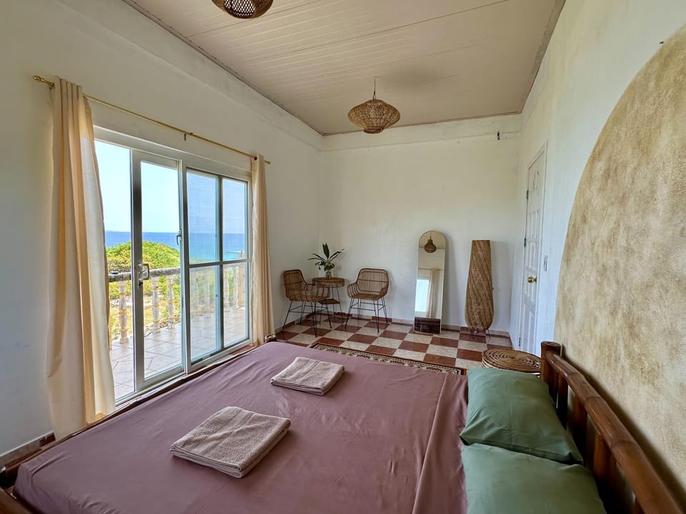 Bed, Day, View (from property/room), Balcony/Terrace, Photo of the whole room, Decorative detail, Seating area, Bedroom, Garden view, Garden view, Sea view, Sea view, Time of day, furniture, towels