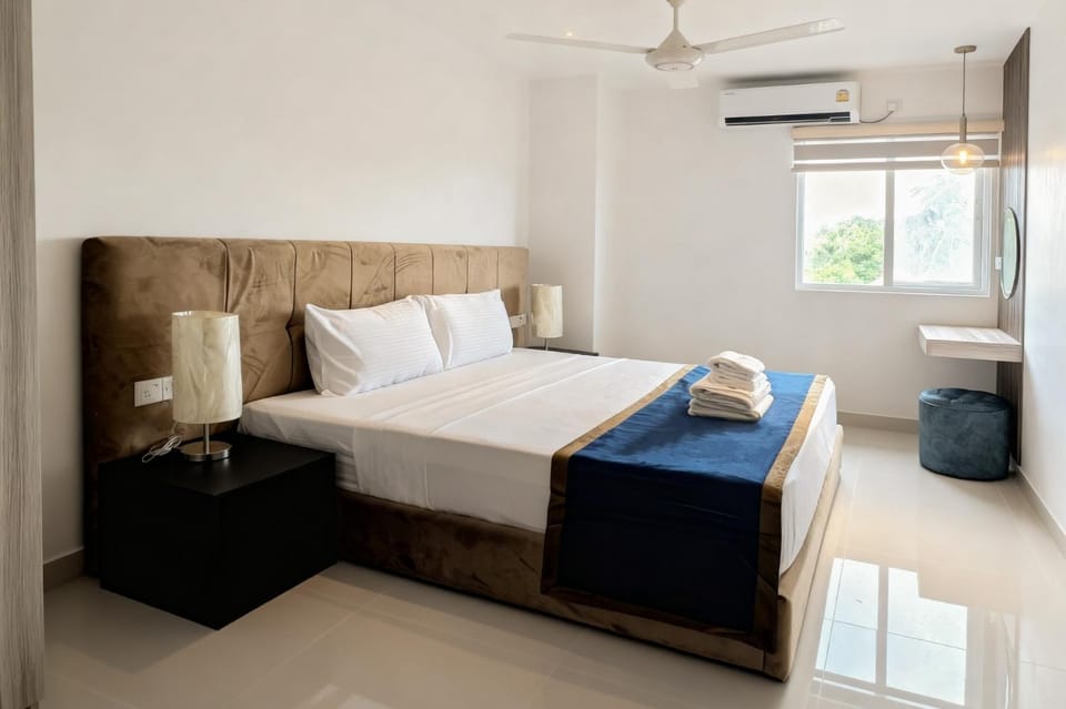 Bed, Living room, Seating area, Bedroom, air conditioner