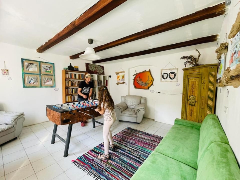 Communal lounge/ TV room, People, Activities, Game Room, Living room, Lounge or bar, Decorative detail, Seating area, Entertainment, children, young children, older children, Family, pet friendly