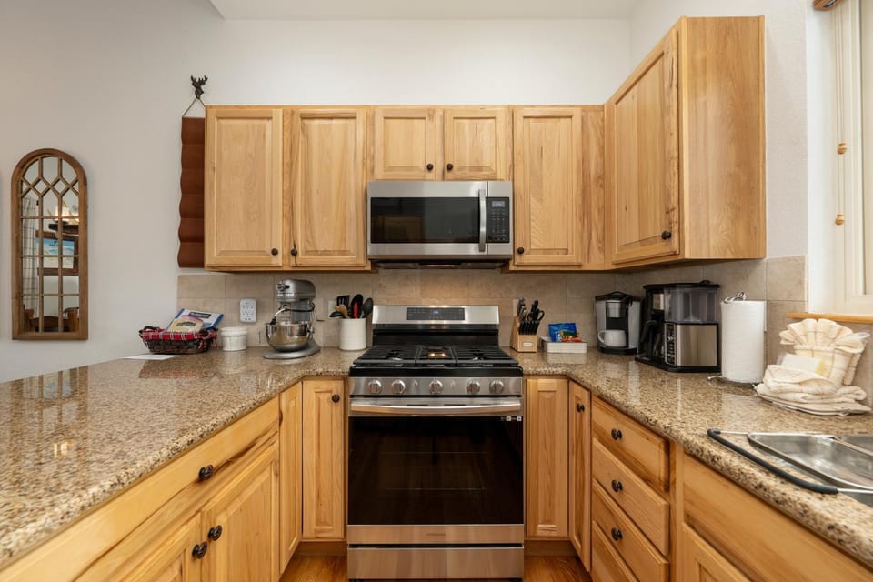 Kitchen or kitchenette, microwave, oven, stove, kitchen