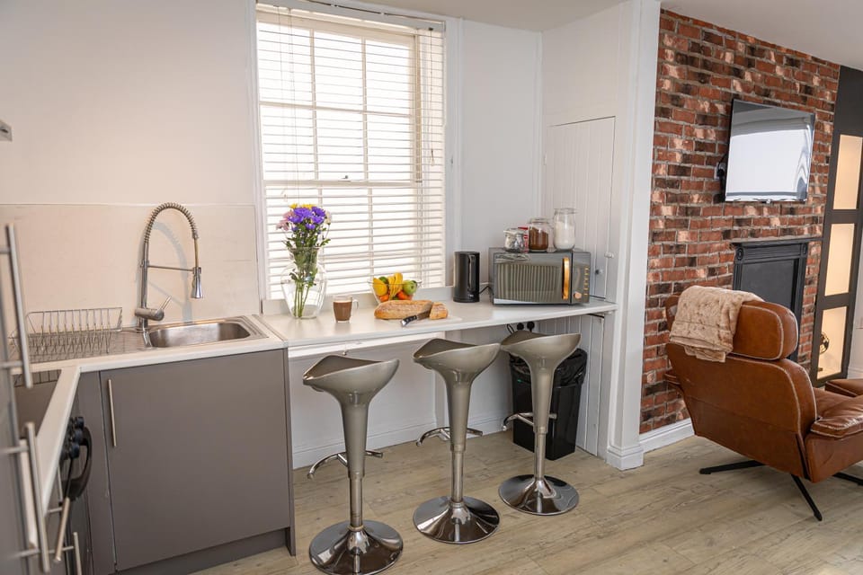Kitchen or kitchenette, oven, stove
