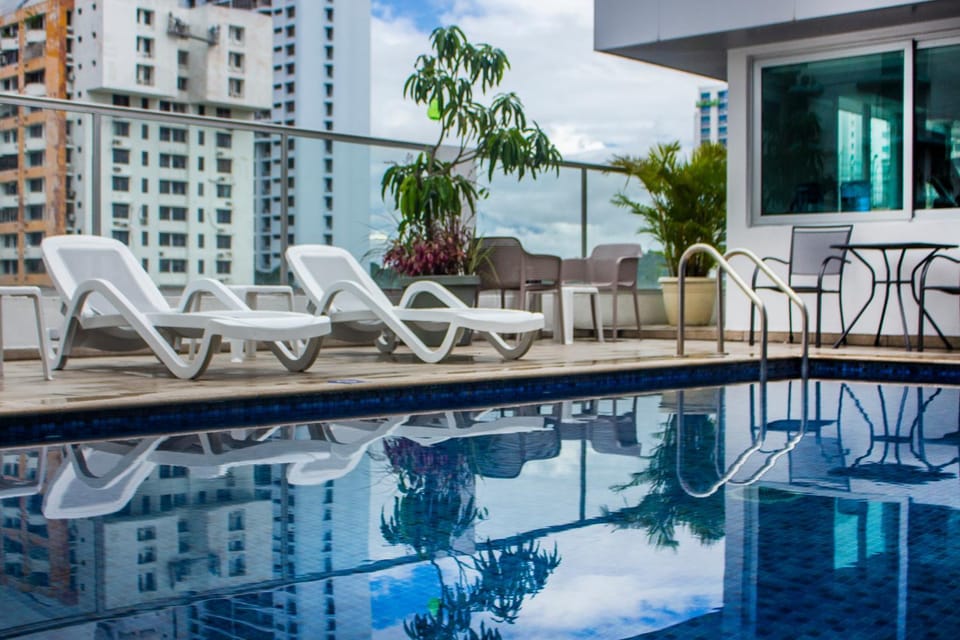 Swimming pool, sunbed