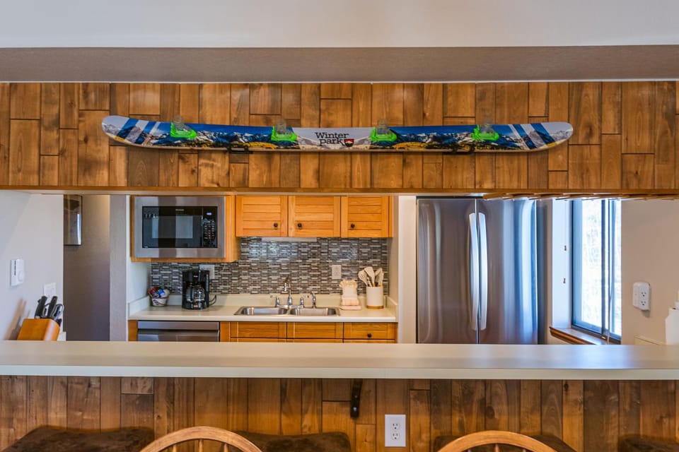 Skiing, Kitchen or kitchenette, furniture, microwave