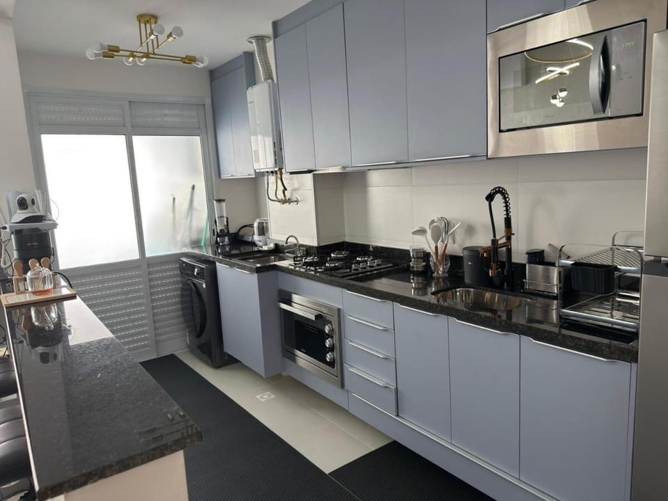 Apartamento a menos de 100 m da praia Asturias - Guarujá Beach Apartment in State of São Paulo