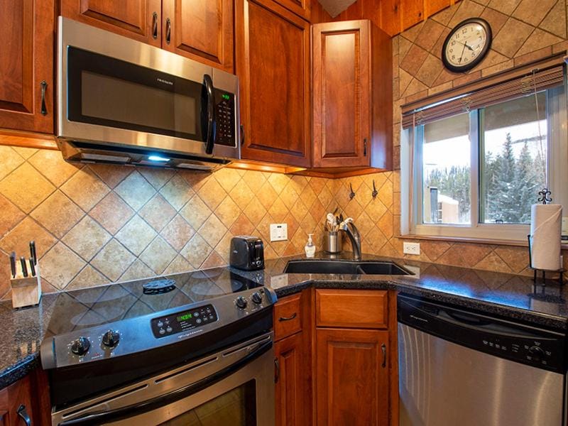 Kitchen or kitchenette, microwave, oven, stove, kitchen