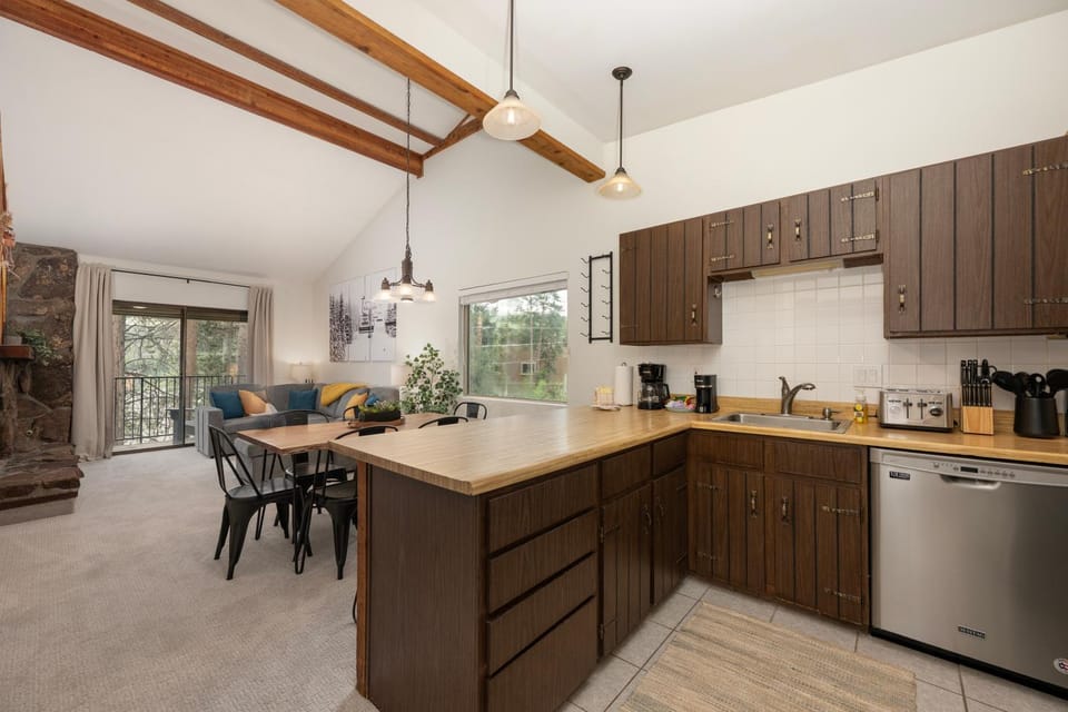 Kitchen or kitchenette, Living room, Seating area, Dining area, fireplace, furniture, toaster, kitchen