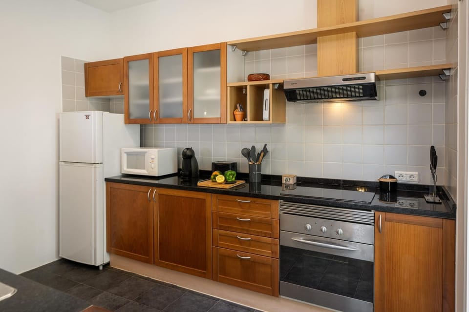 Kitchen or kitchenette, oven, stove, toaster