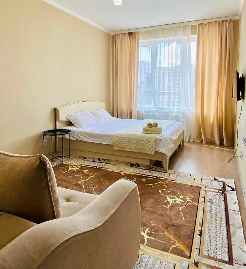 1-комнатная по Турану Apartment in Kazakhstan