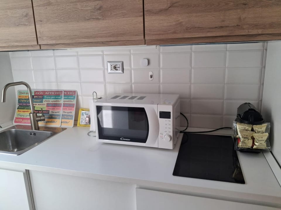 Kitchen or kitchenette, stove