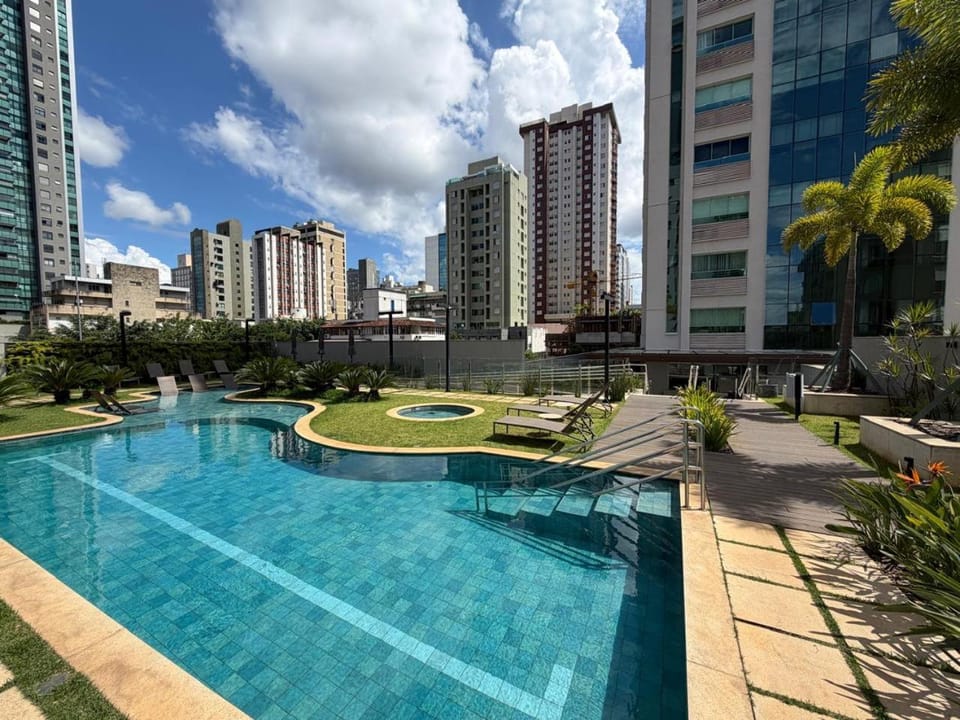 Property building, Day, Pool view, Swimming pool, sunbed