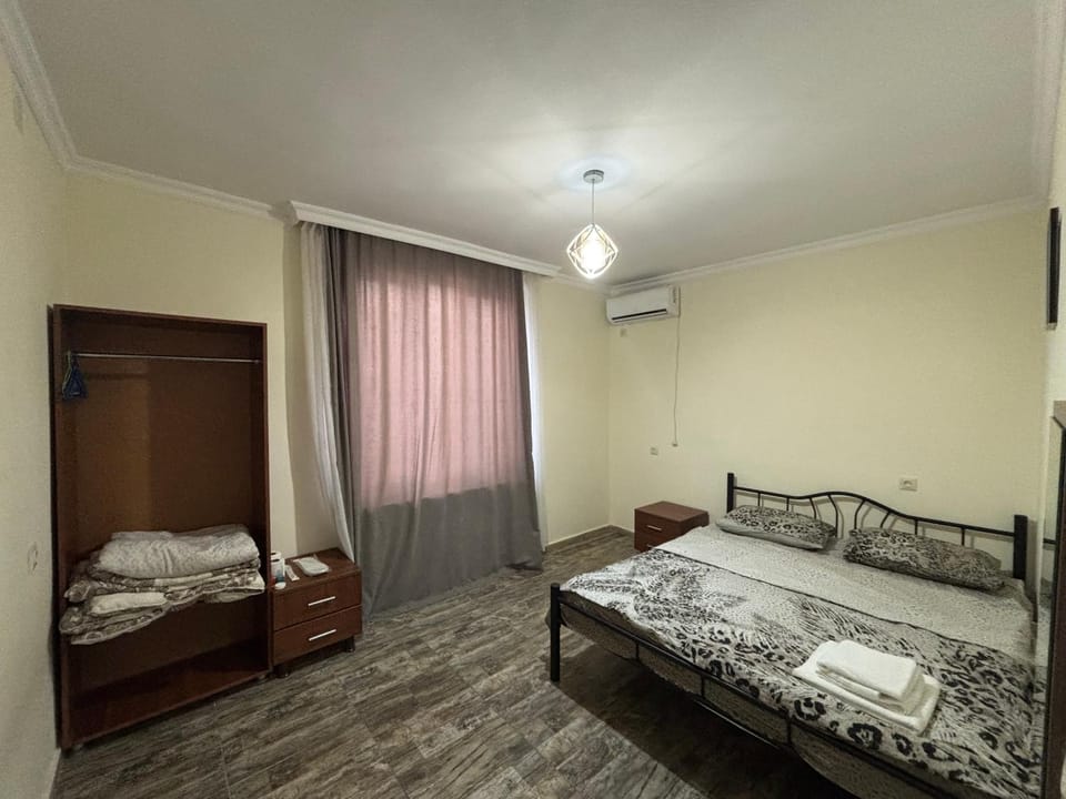 Bed, Photo of the whole room, Bedroom, towels, air conditioner