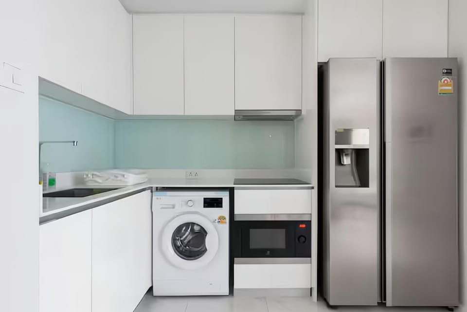 Kitchen or kitchenette, stove, washing machine