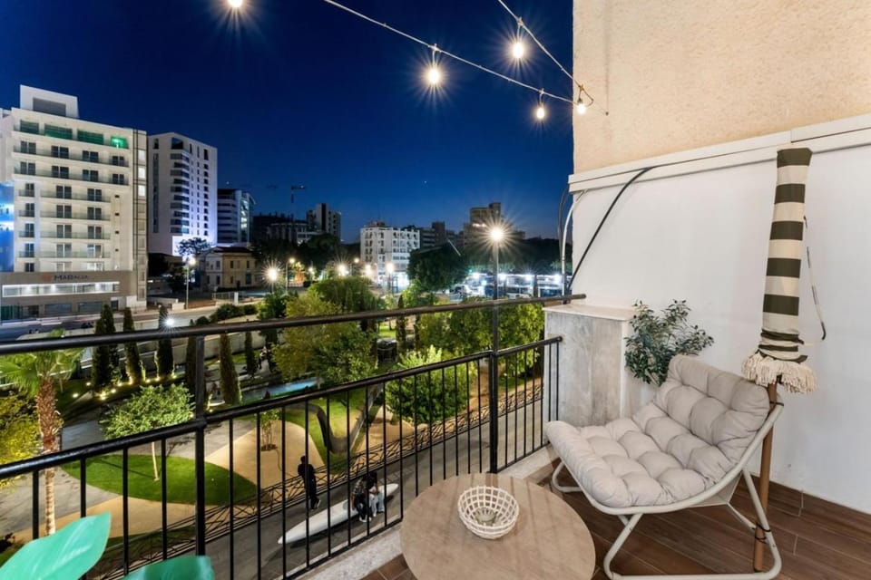 Property building, Night, View (from property/room), Balcony/Terrace, Seating area, City view