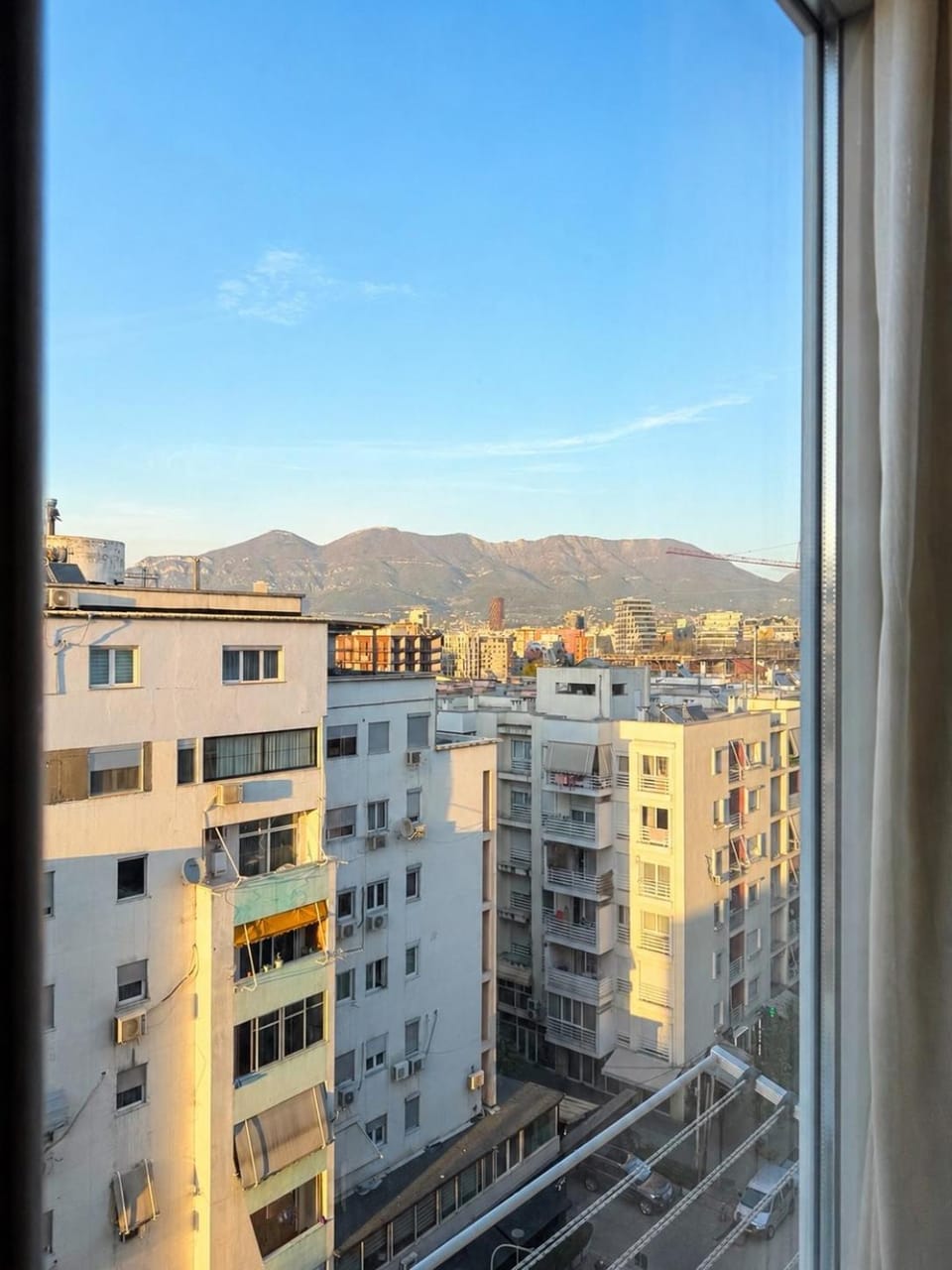 Property building, Day, Natural landscape, City view, Mountain view, Sunrise, Sunset