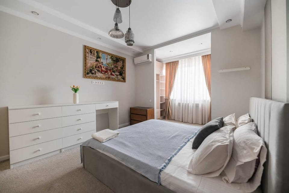 Bed, Bedroom, towels, wardrobe, air conditioner