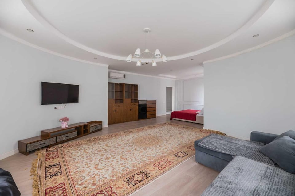 Bed, TV and multimedia, Living room, Seating area, wardrobe, air conditioner