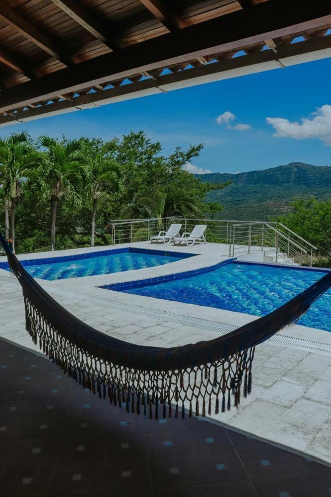 Property building, Day, Natural landscape, Mountain view, Pool view, Swimming pool, sunbed
