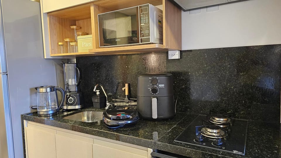 Kitchen or kitchenette, oven, toaster