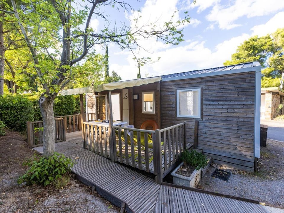 Mobil home clim, animaux OK - 4 pers. - API-1-52-2247 Campground/ 
RV Resort in Occitanie