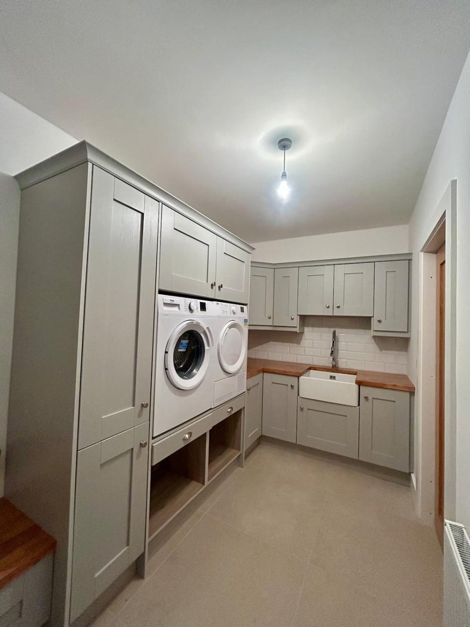 Kitchen or kitchenette, laundry, washing machine, washing machine, dryer
