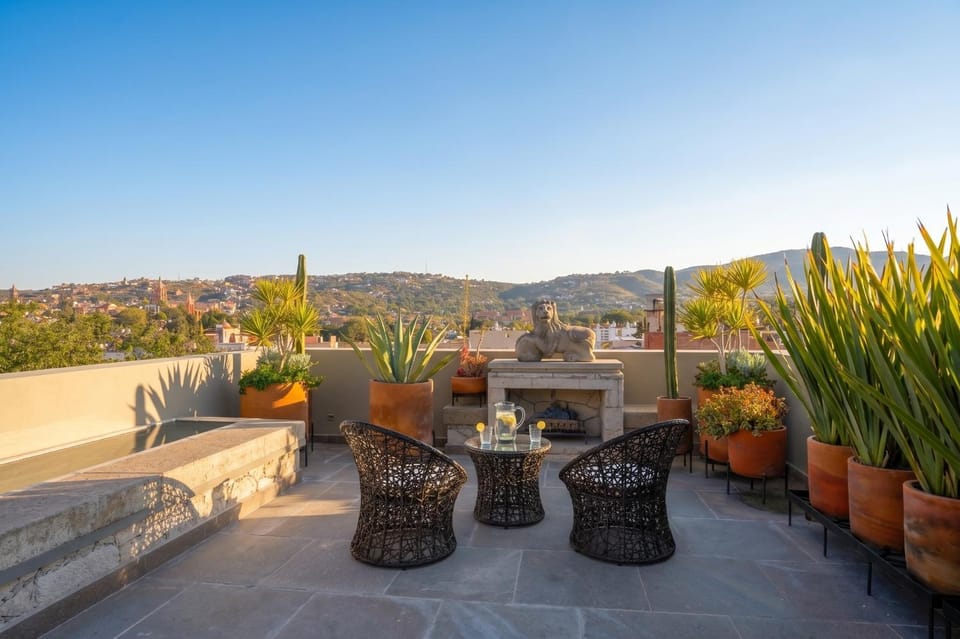 Balcony/Terrace, Seating area, City view, Mountain view, Sunset, fireplace