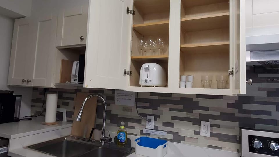 Kitchen or kitchenette, stove, toaster