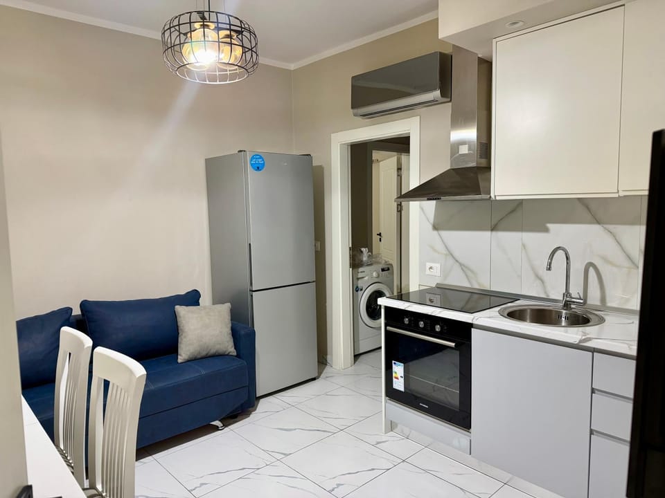 Kitchen or kitchenette, Seating area, oven, stove, air conditioner