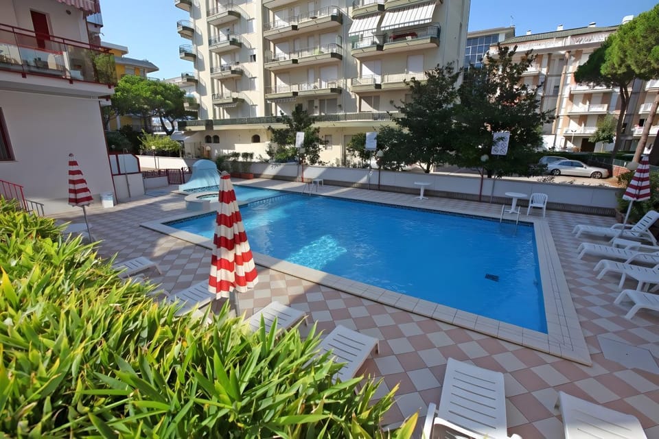 Property building, Living room, Swimming pool