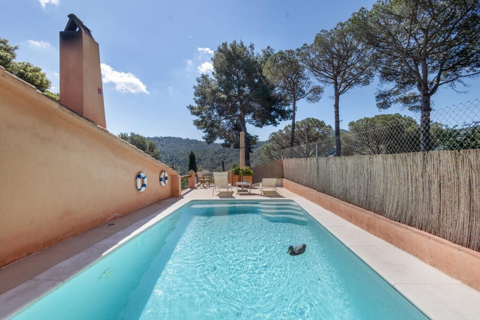 Property building, Living room, Swimming pool