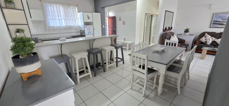 Living room, Seating area, Dining area, microwave, oven, stove, toaster, kitchen
