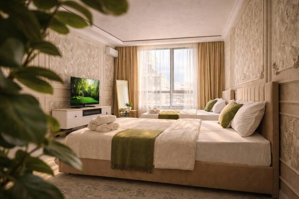 Communal lounge/ TV room, Bed, TV and multimedia, Living room, Photo of the whole room, Seating area, Evening entertainment, Bedroom, towels