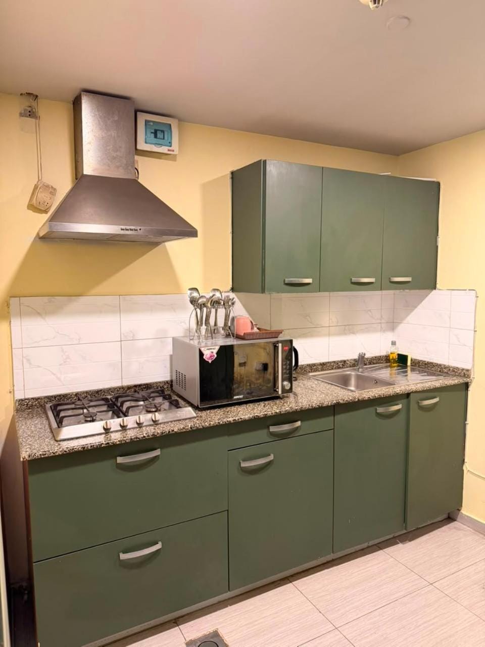 Kitchen or kitchenette, stove, toaster
