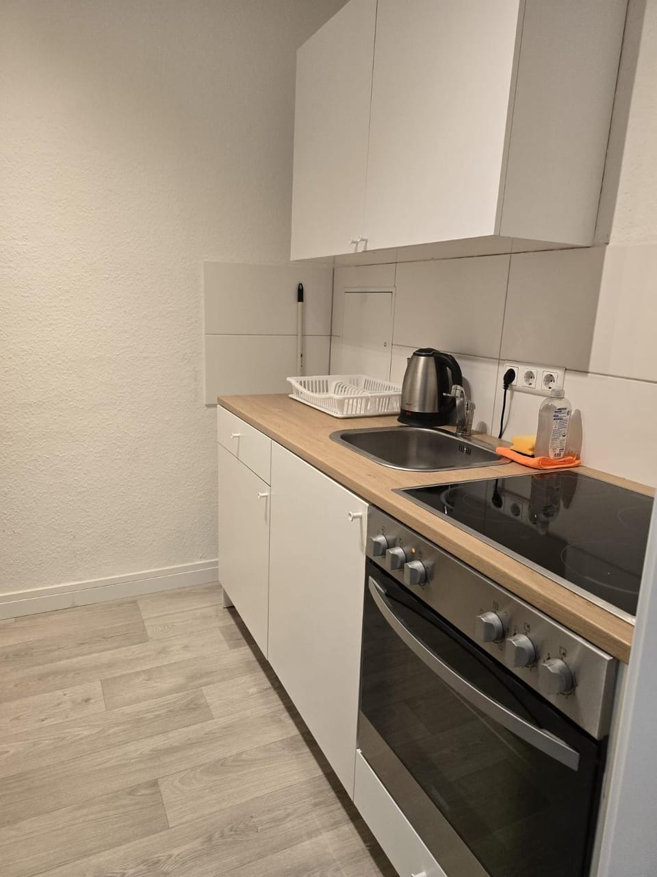 Kitchen or kitchenette, microwave, oven, stove, kitchen