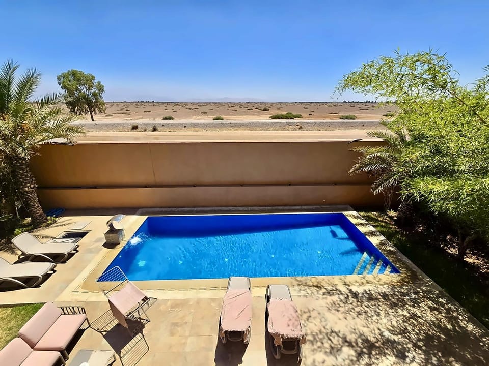 Patio, Day, Pool view, Swimming pool, sunbed