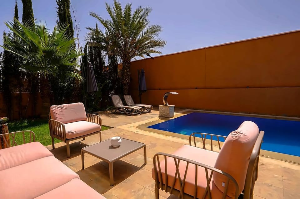 Patio, Day, Seating area, Pool view, Swimming pool, sunbed