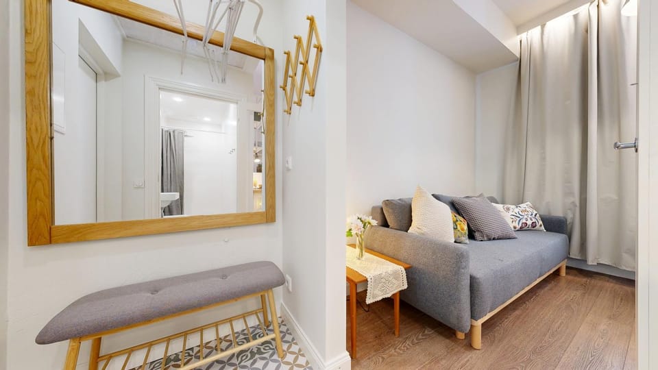 Bed, Living room, Seating area, Bedroom