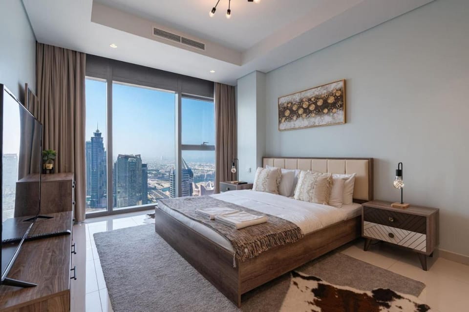 Near Dubai Mall PoolAccess SunSetView KingBed House in Dubai