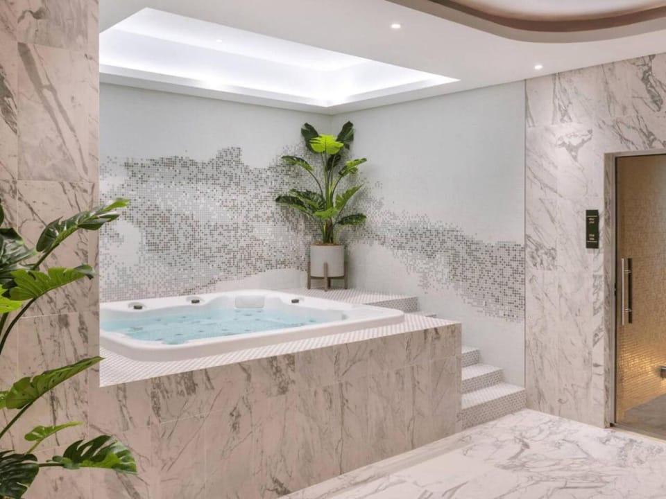 Near Dubai Mall PoolAccess SunSetView KingBed House in Dubai