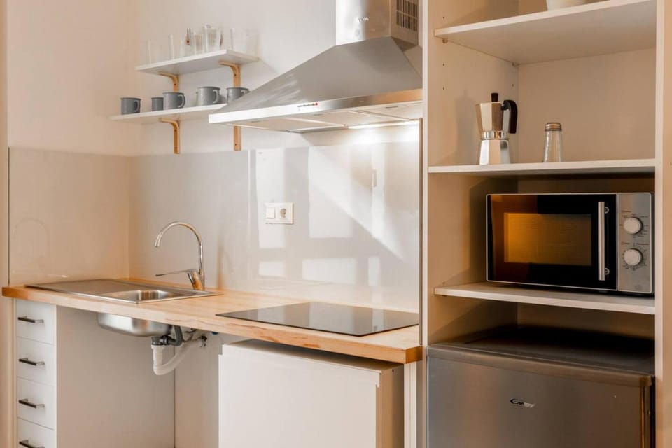 Kitchen or kitchenette, stove