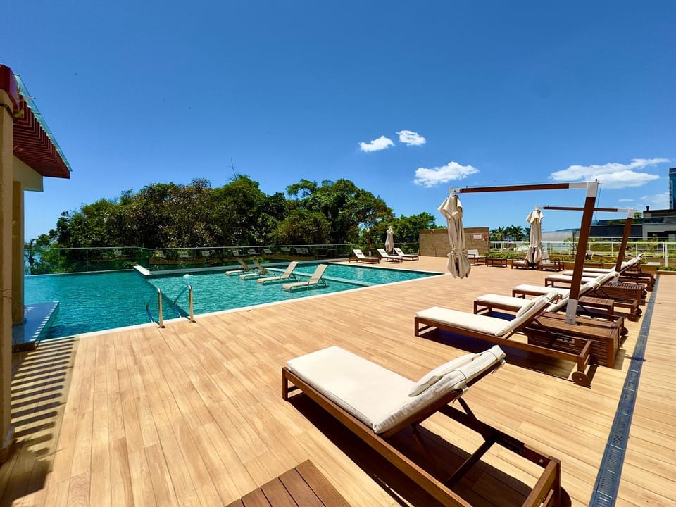 Swimming pool, sunbed
