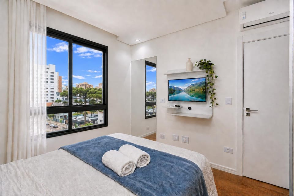 Batel Studio • City View • Rooftop Pool Apartment in Curitiba