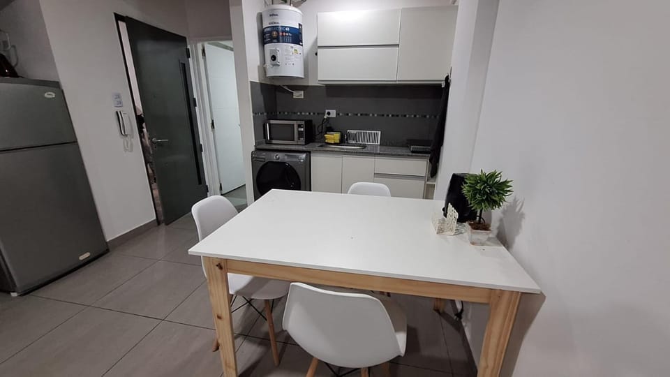 Kitchen or kitchenette, Dining area, washing machine