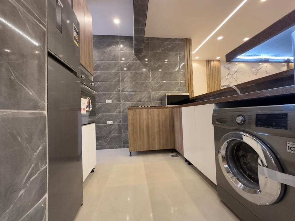 Kitchen or kitchenette, minibar, oven, washing machine, dryer