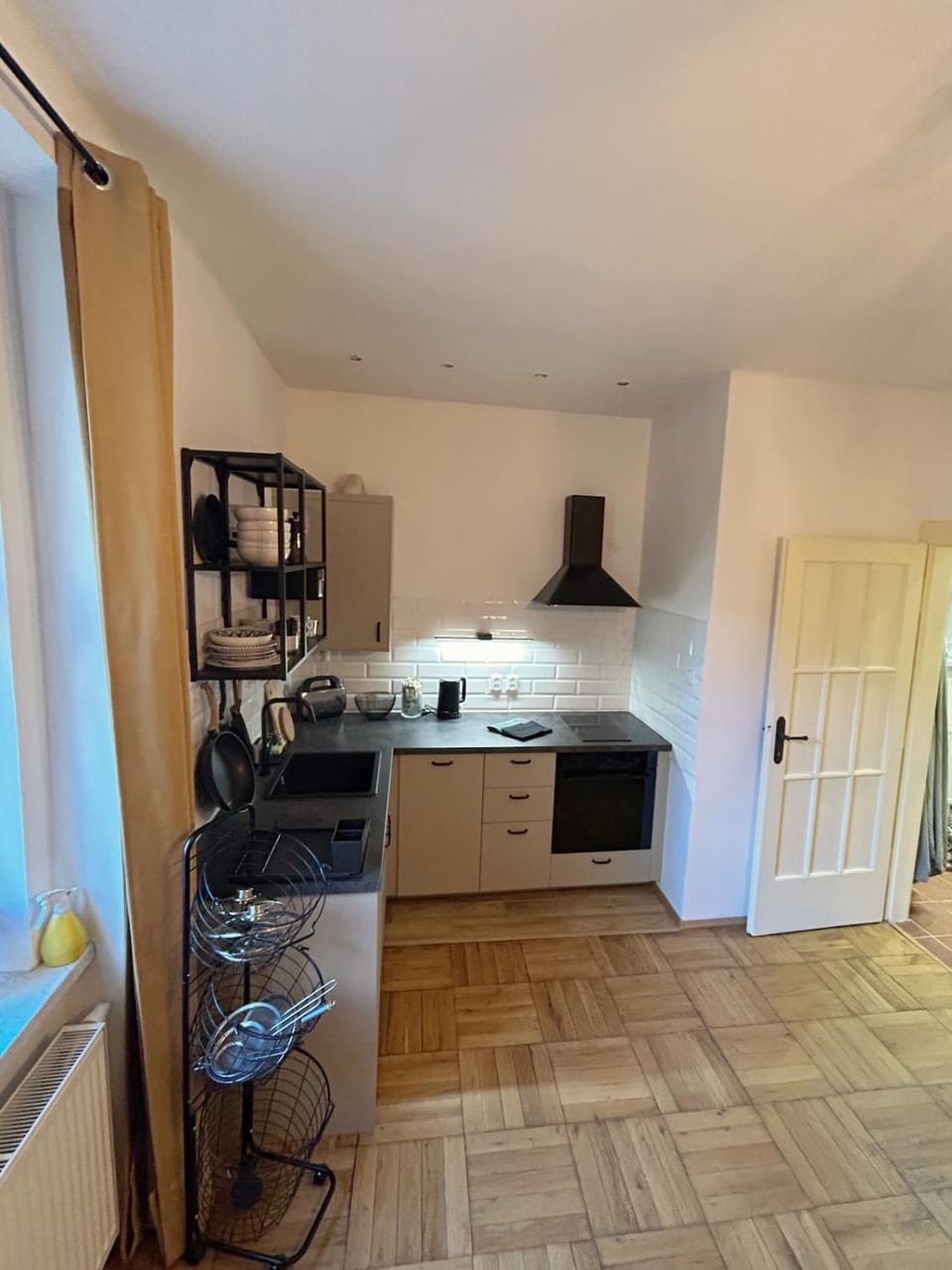 Kitchen or kitchenette, dishwasher, stove, toaster
