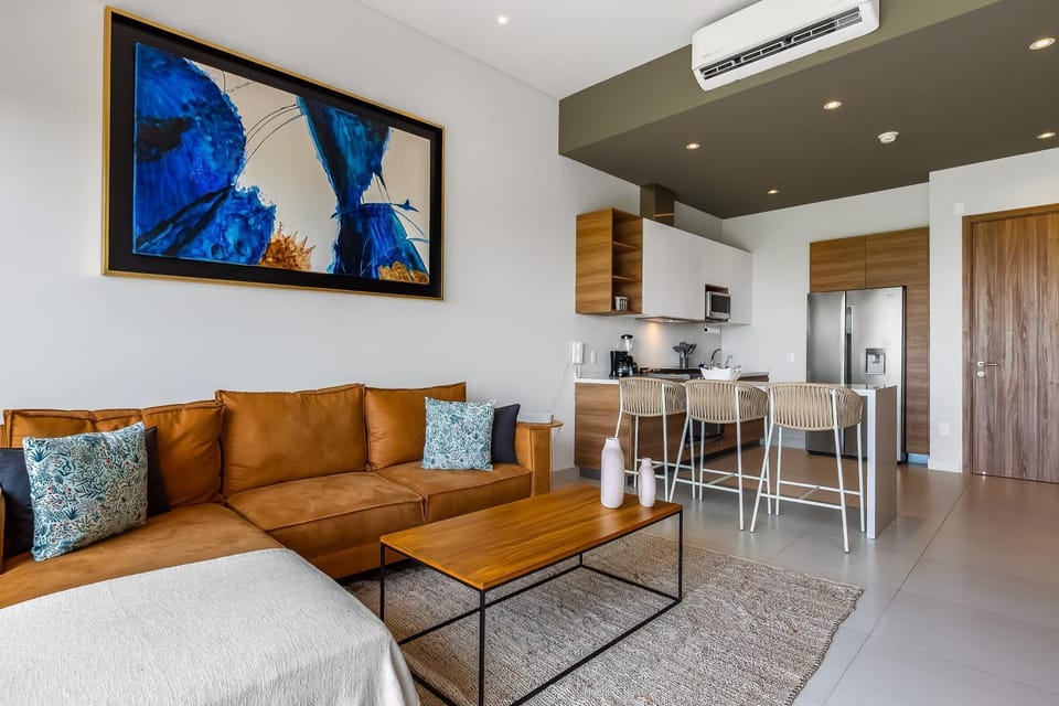 TV and multimedia, Kitchen or kitchenette, Living room, Seating area, air conditioner