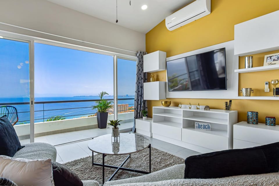 TV and multimedia, Living room, Seating area, Sea view, air conditioner