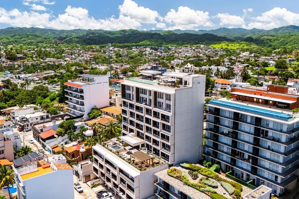 Property building, Nearby landmark, Day, Neighbourhood, Natural landscape, Bird's eye view, City view, Mountain view, Pool view, Street view, Swimming pool, Location